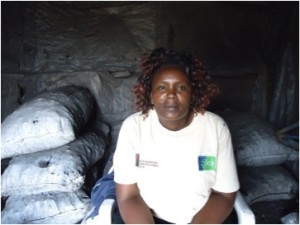 Jecinta from Kenya received a loan to buy stocks of charcoal to sell.