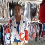 Rosaria of Honduras received $1,075 to buy long shorts, short sleeve shirts, and long sleeve shirts to sell in her second-hand shop.