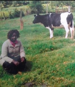 Chelangat in Kenya received $875 from iZosh to buy another dairy cow for her vegetable and milk-vending business.