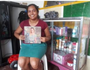 Cherilis in Colombia received $200 from iZosh to buy women's footwear to expand sales in her store in her home.