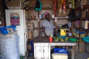 Cissy in Uganda received $175 from iZosh to buy products and local goods to sell in her retail shop.