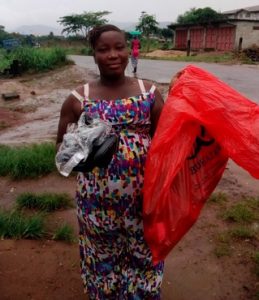 Margaret in Sierra Leone received $175 from iZosh to buy shoes and related items to sell in her shoe retail business.