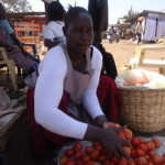 Roseline of Kenya received $225.00 to buy tomatoes and packaging to sell.