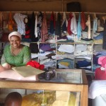 Hajara of Uganda received $925 to buy stock of clothes and bedding.