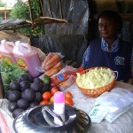 Esther of Kenya received $300 to add stock to her groceries.