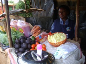 Esther of Kenya received $300 to add stock to her groceries.