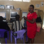 Caroline from Kenya received $175 to rent space to do more computer training in her cyber cafe business.