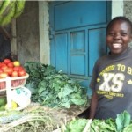 Gladys from Kenya received $75 to buy onions, potatoes, tomatoes, and other groceries for her business selling groceries.