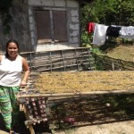 Zencerly from the Philippines received $450 to buy hogs and treats for her businesses raising hogs and selling candy.