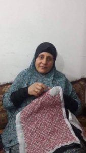 Houria from Palestine received a loan of $2,775 to buy sewing tools and fabric.