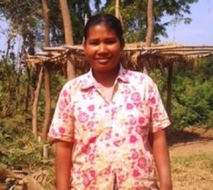 Rin from Cambodia received a loan of $500 to buy a water pump to maximize her rice harvest.
