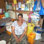 $125 from iZōsh complete a loan of $200 to help Isatu purchase assorted drinks and other provisions to expand her business.