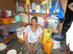 $125 from iZōsh complete a loan of $200 to help Isatu purchase assorted drinks and other provisions to expand her business.