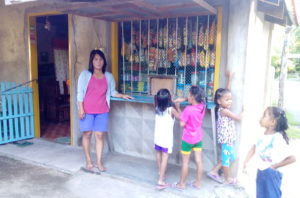 Annaliza in the Philippines received a loan of $57 to increase the selection in her convenience store.