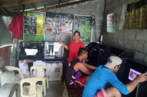 Gina in the Philippines received a loan of $200 for maintenance of her internet cafe.