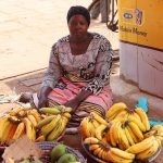 Beatrice in Uganda received $100 from iZosh to buy additional capital for her business selling bananas and raising cattle.