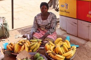 Beatrice in Uganda received $100 from iZosh to buy additional capital for her business selling bananas and raising cattle.