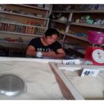 Chat in the Philippines received $250 from iZosh to buy goods to expand her general store.