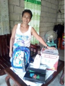 Daisy in the Philippines received $225 from iZosh to buy products for her dried goods business.