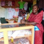 Rebecca in Uganda received $225 from iZosh to buy supplies for her business making clothing for families.